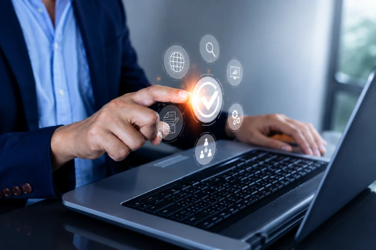 Business professional using digital ERP interface for Odoo implementation services and Odoo ERP implementation.